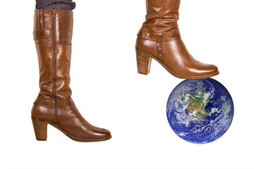 Brown woman's boot smash the earth