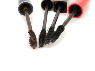 Four brushes for a mascara  on a white background