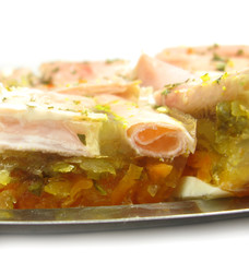 Cold dish with eggs, ham, carrots and cucumber
