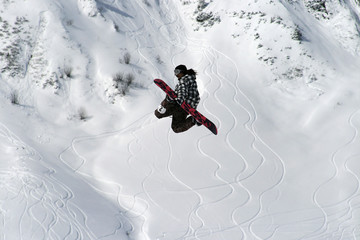 Snowboarder performing freestyle element