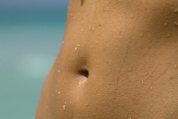 close-up of female stomach