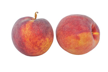 pair of ripe peaches on white