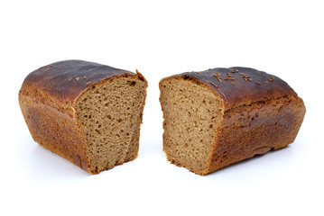 Two chunks of rye bread with anise
