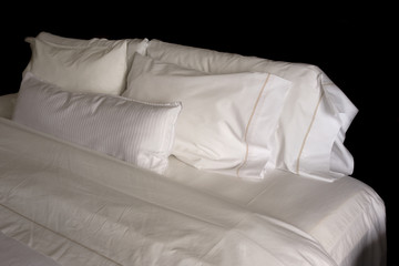 pillows on a hotel bed
