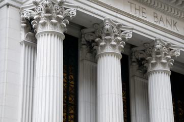 Ionic columns of a bank building - obrazy, fototapety, plakaty