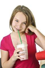 Teenage girl with milkshake