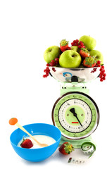 Scale with fruit for diet and yogurt