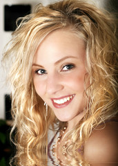 Curly blonde hair - pretty teen girl -