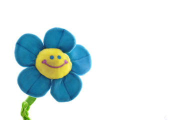Happy colorful flower smiling  isolated on white