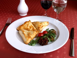 Dish of Italian cuisine - Greek patties with cheese