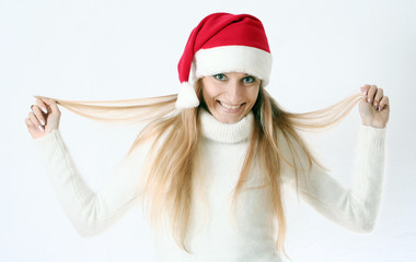 girl smiles in a New Year's cap