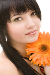 Young woman with orange flower