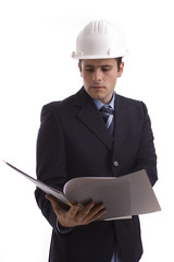 Young Engineer, reading a plan