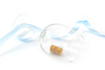 wineglass and blue ribbon