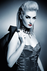 Sexy gothic woman with creative hairstyle