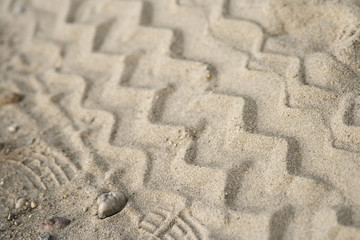 Fototapeta na wymiar Ślady na piasku