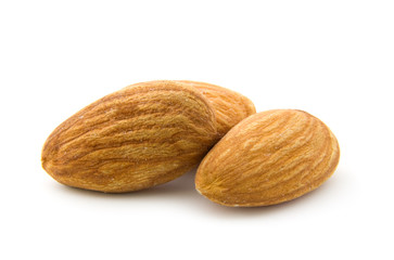 Thee almonds isolated on white