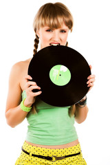 Playful blond girl with vinyl record