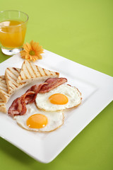 Breakfast - toasts, eggs, bacon