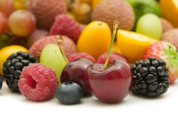 Naklejka na ściany i meble fresh berries and fruits on white background