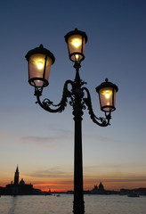 Obraz premium Street Light Against Venice at Sunset