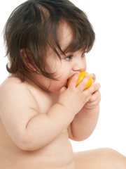 child eating orange