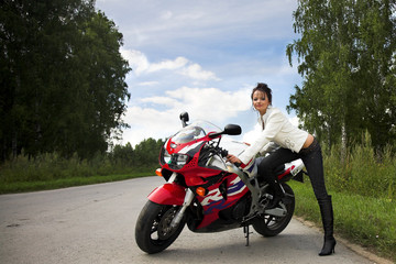 Obraz premium girl with motorbire