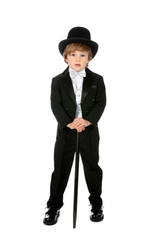 handsome young boy in black tuxedo and tophat