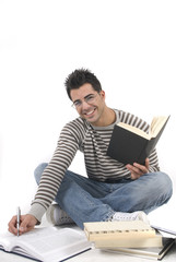 beautiful man studying at the university isolated in white