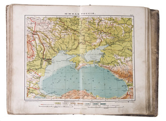 old XIX century geographical mapbook open