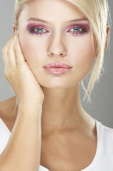 Fototapeta premium Girl wearing makeup made of flowers