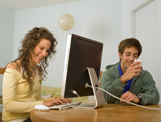 teenager couple computer