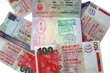 Hong Kong dollars and stamped passport