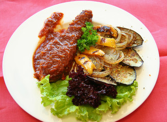 Meat with sauce and vegetables