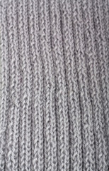 Knitted grey wool muffler texture