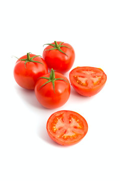 a group of fresh ripe tomatoes