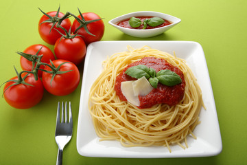Italian pasta spaghetti with tomato sauce and parmesan.
