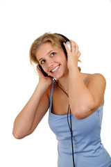 Naklejka premium Pretty girl listening to the music