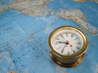 Brass Clock on World Map
