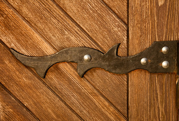 wooden door with metal hinge