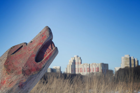 the wooden head of cult woolf in the suberb of Moscow