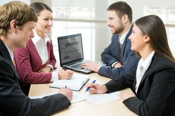 Smiling business people