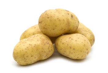 raw potatoes on white background