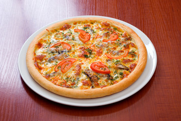 Pizza   tomatoes,sprats