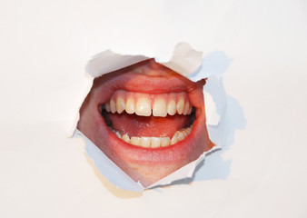womans mouth through paper