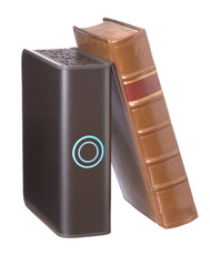Single old leather bound book and hard drive