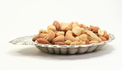Assorted nut in sterling silver bowl