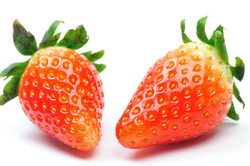 two strawberries isolated in white background
