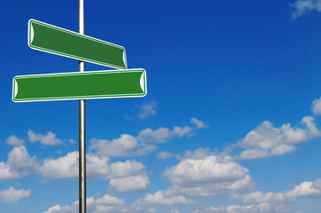 Blank Green Street Name Signs Agains a Bright Blue Sky