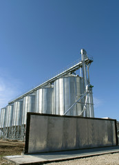 Steel granary against a blue sky